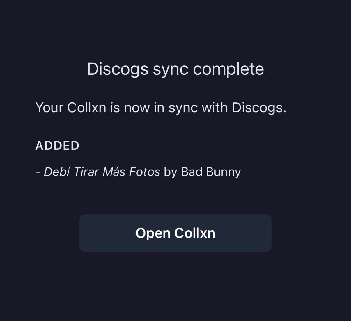Discogs sync complete notification showing Bad Bunny added
