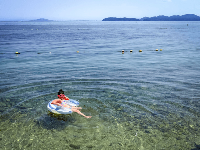 My 8-year-old living her best life at Lake Biwa